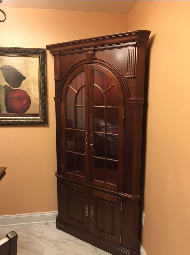 Corner cabinet cherry $250 very good condition. Pick up ( Gaithersburg)
