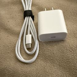 Apple 20W USB-C Power Adapter and a USB-C to USB-C Woven Charge Cable.