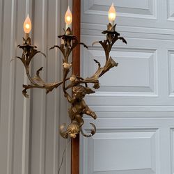 Cherub Regency style Italian three light wall sconces
