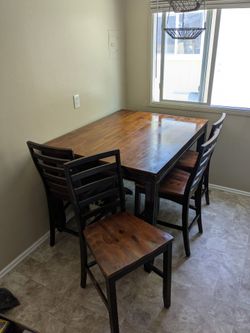Dining table and chairs set