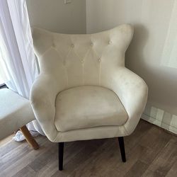 White tuft winged back chair