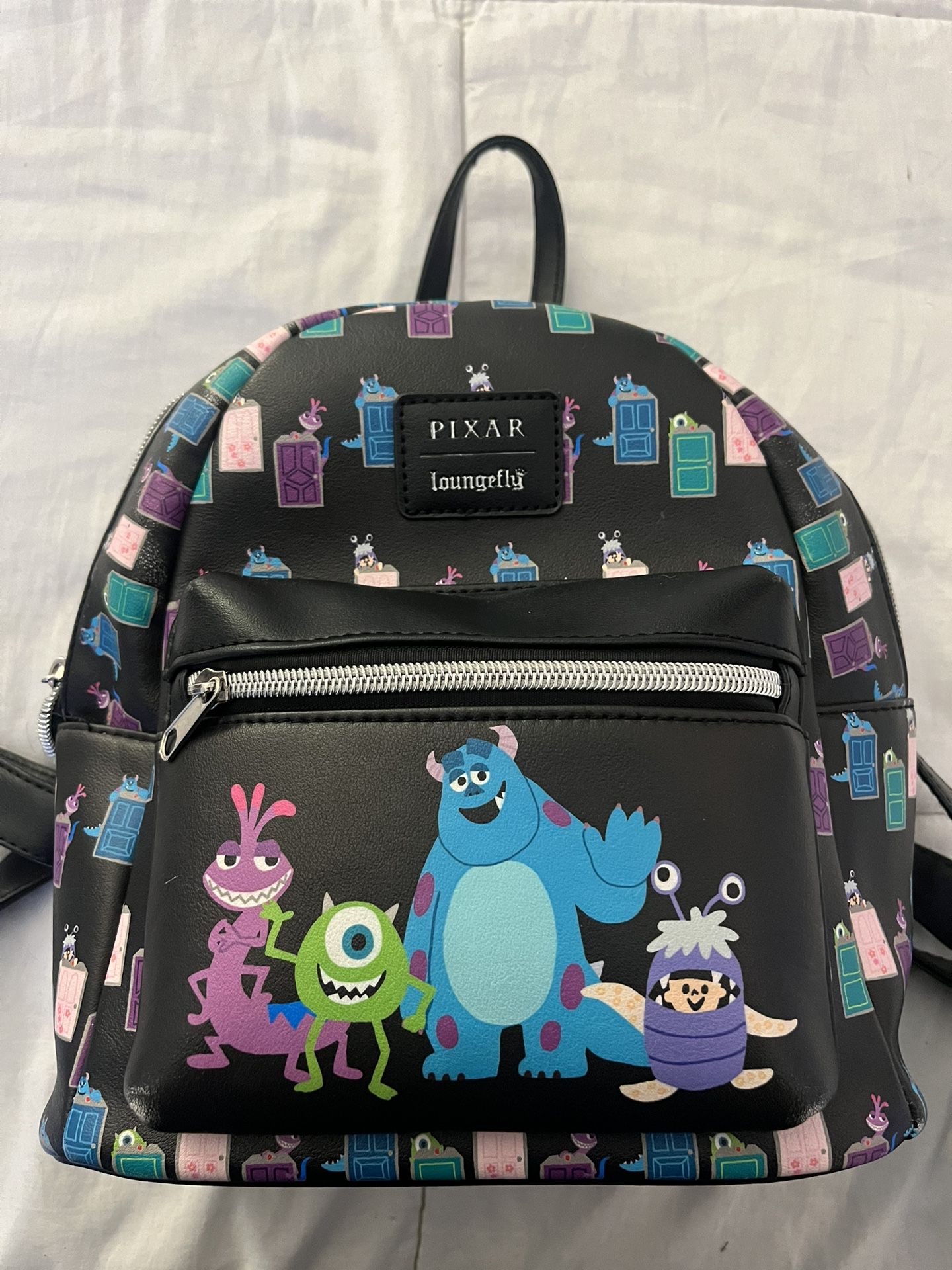 Loungefly Monsters Inc Doors Backpack