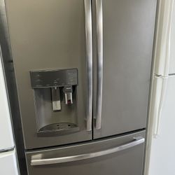 GE Dark Stainless Steel French Door Refrigerator With Coffee Maker In The Front 36” Wide 69” Tall Like New Condition Plus 4 Months Warranty 
