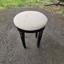 Small stool for a vanity