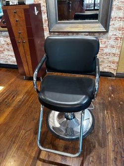 Black hair styling chair