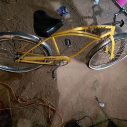 Yellow Schwinn Heavy Duti Bike