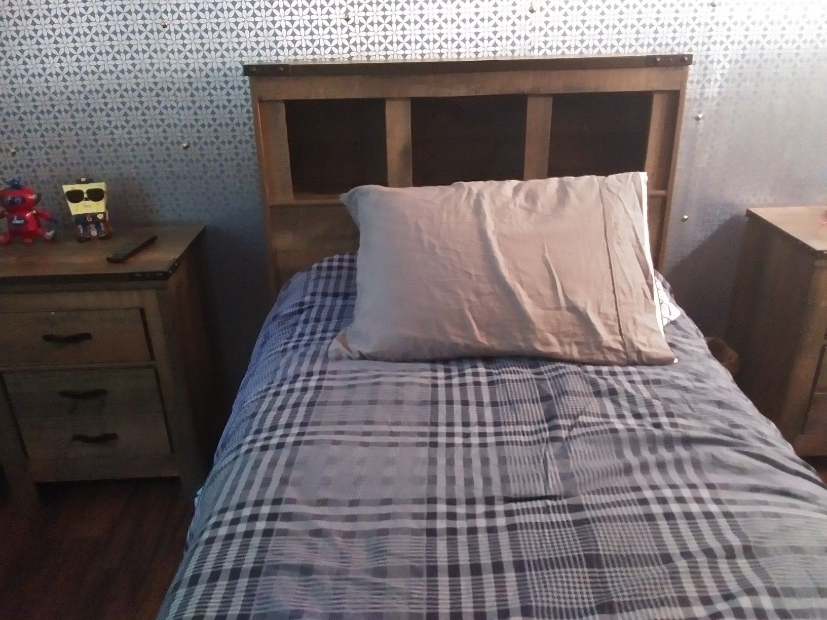 Twin bed barely used with storage on the top and side, a mattress with original plastic covering. Asking $400.00.00