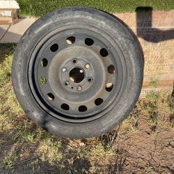 Spare Tire. Temporary Use Only.