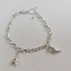 Silver Bracelet With 2 Charms