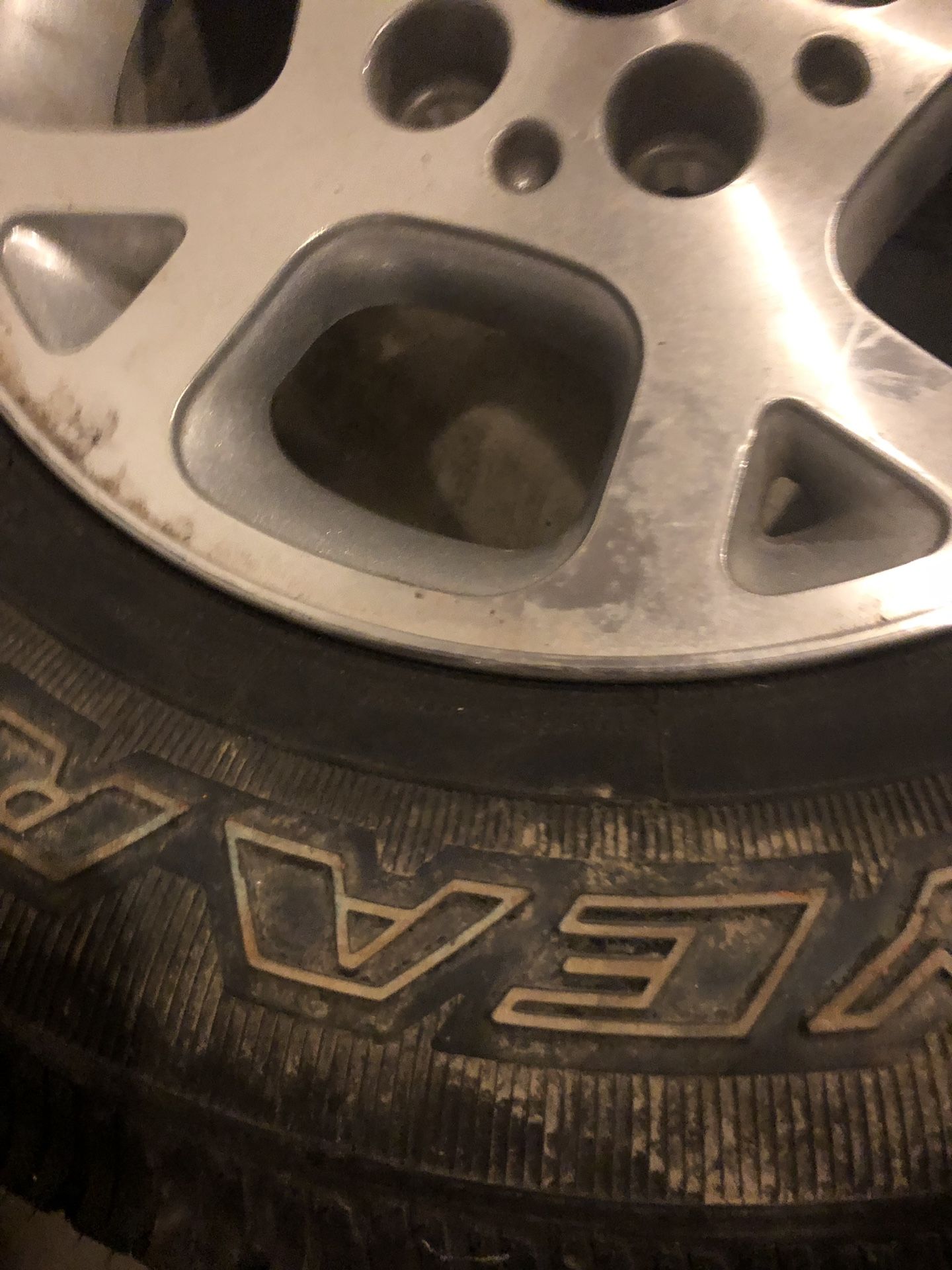 Used good year tire mounted on wheel.