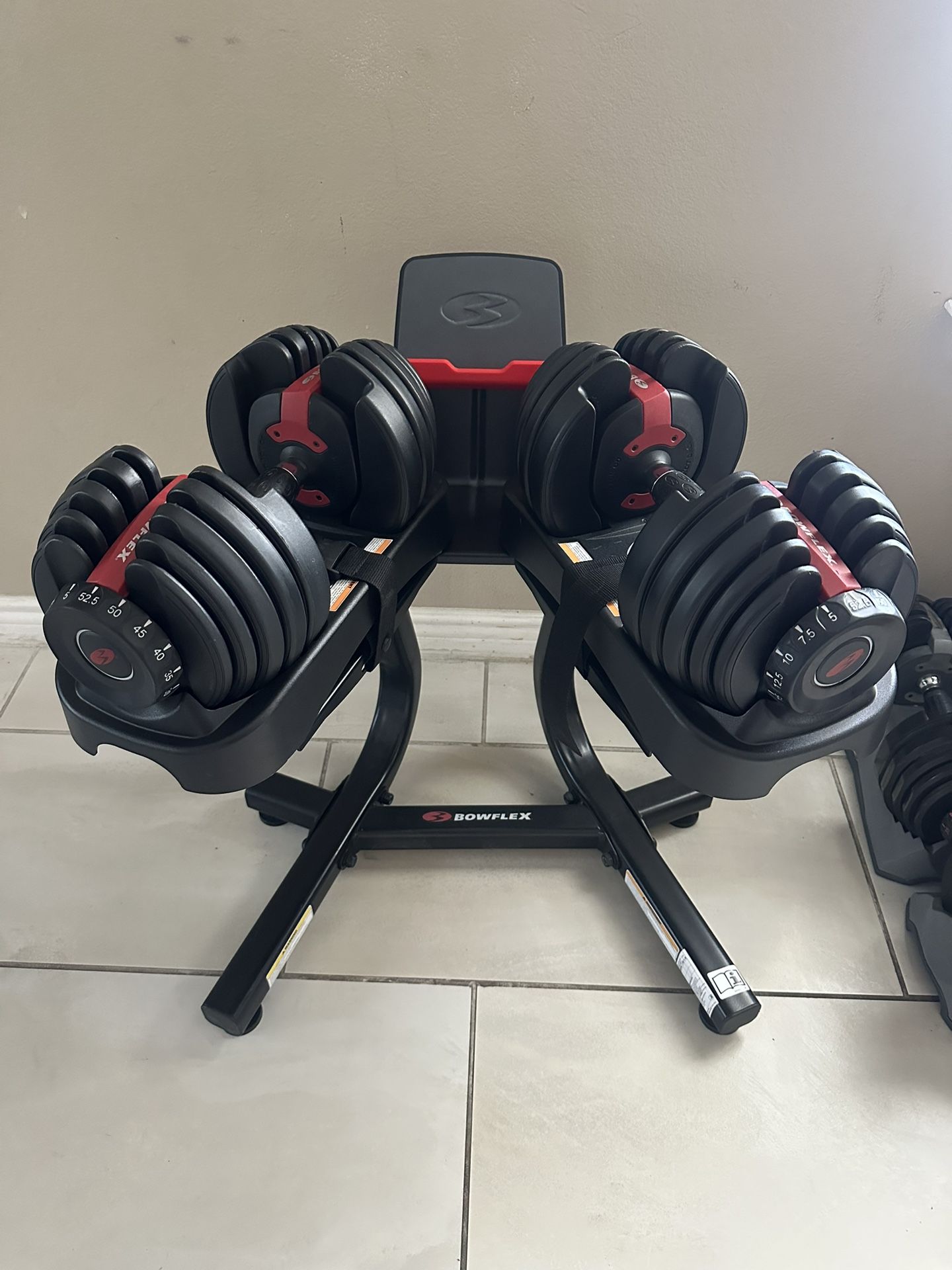 Bowflex adjustable weights 5-52.5 plus stand like new