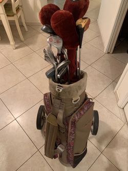 Two used golf bags and used gold clubs