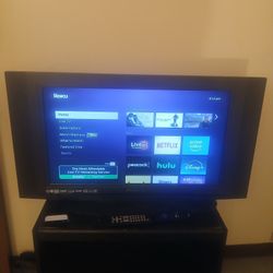 Tv With Roku Streaming Devices & TV Stand