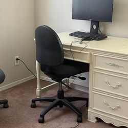 2 Black office rolling chairs