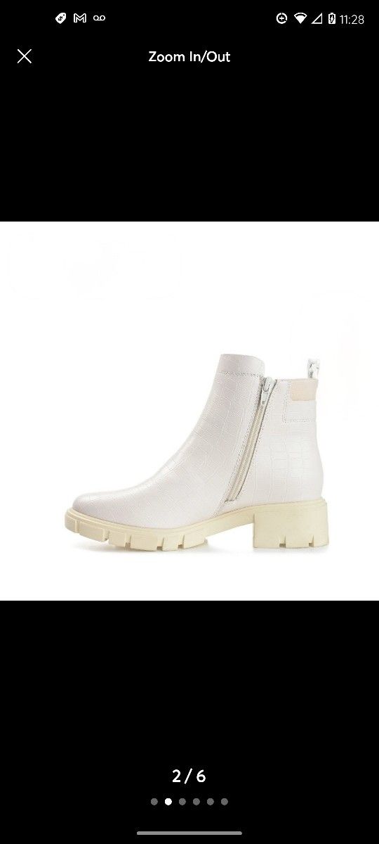White Journee Collection size 12 boots retails for $68