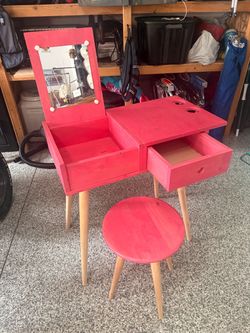 Pink wood vanity and chair