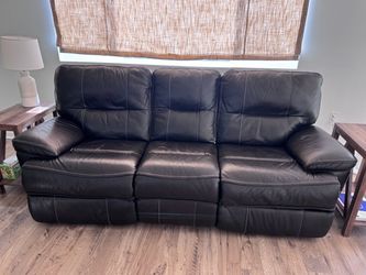 Brown Leather Reclining Sofa