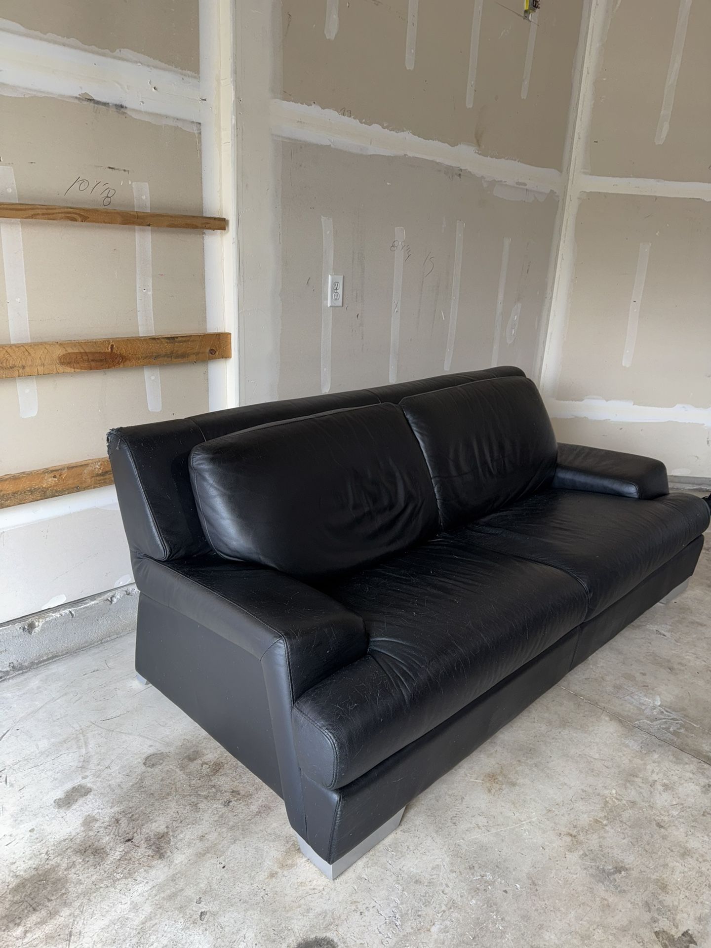 Black Leather Extended Love Seat Couch / Sofa