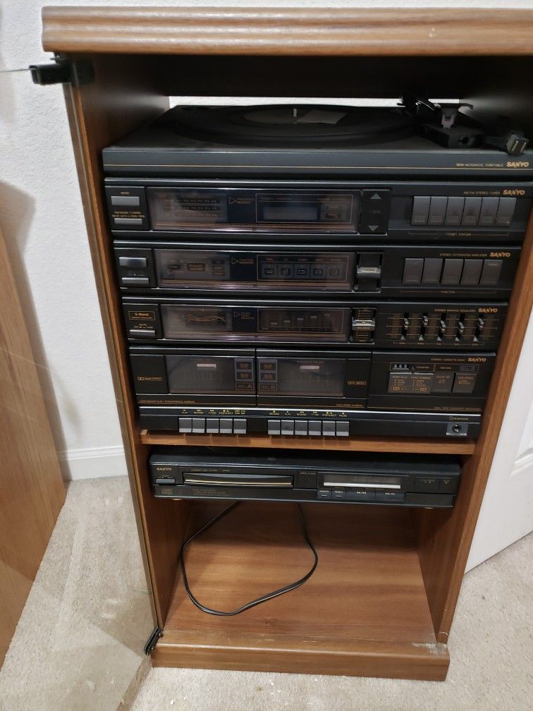 Stereo, Cassette Player, Amiplier, Cd Player, Turn Table and Two Speakers
