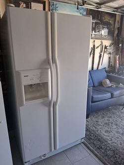 FRIDGE..FRIDGE...KENMORE SIDE BY SIDE WORKING GOOD!!!CLEAN..!!
