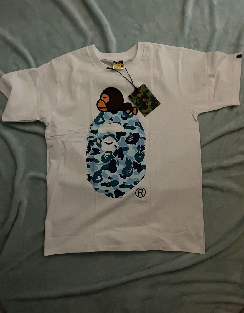 white and blue bape shirt