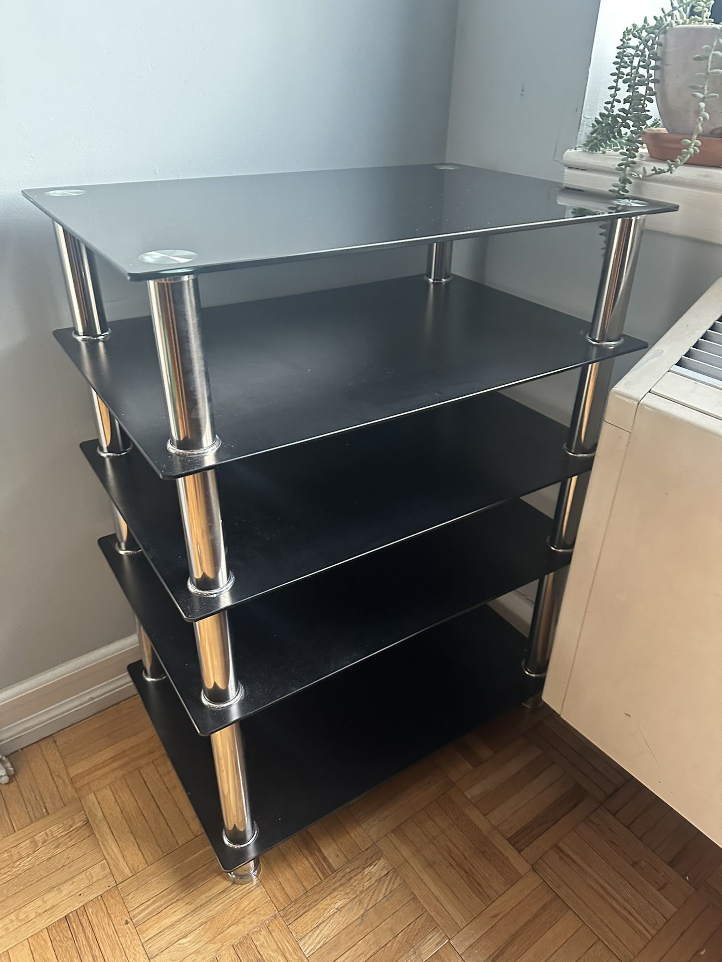 FOR SALE: Modern 4-Tier Black + Chrome Media Shelf – Excellent Condition