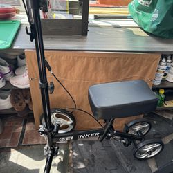 Knee Scooter Like New  Adjustable And Folds Up