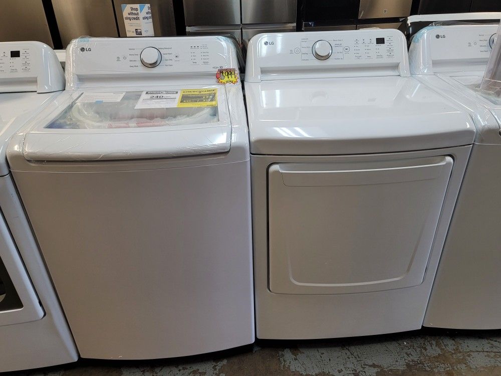 New LG Top Loading Washer And Gas Dryer Set