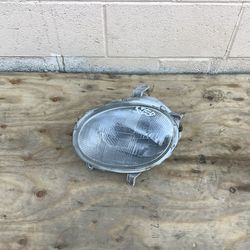 94-99 Toyota Celica Driver Headlight OEM