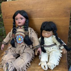 two Native American-inspired porcelain dolls