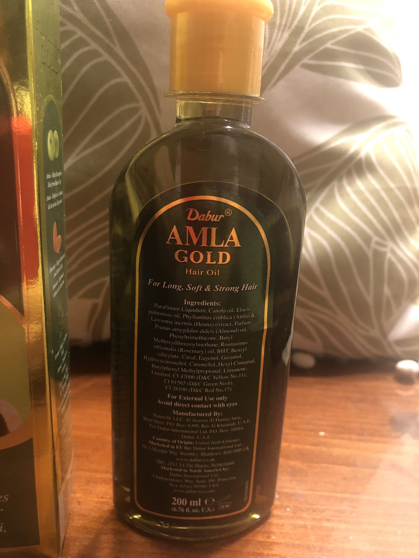 Alma oil, with amla, almond and henna oil.