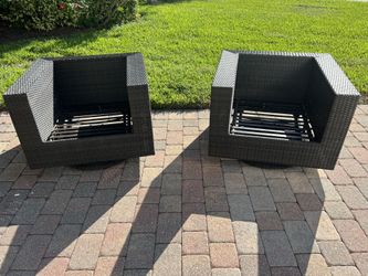 Two very nice brown wicker outdoor patio chairs