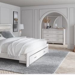 Altyra White LED Bookcase Upholstered Footboard Storage Platform Bedroom Set