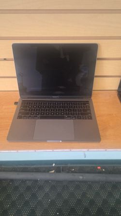 Macbook pro with touch bar 13 inch 90 day warranty