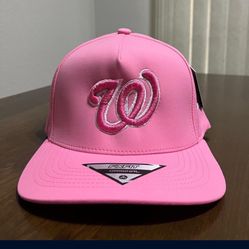 Pink Washington’s hat. Way cap. SnapBack. LA. NY. Trakas. Hooey. Kimes Ranch. Lost Calf. King Ranch. Trucker hat. High Desert Headwear