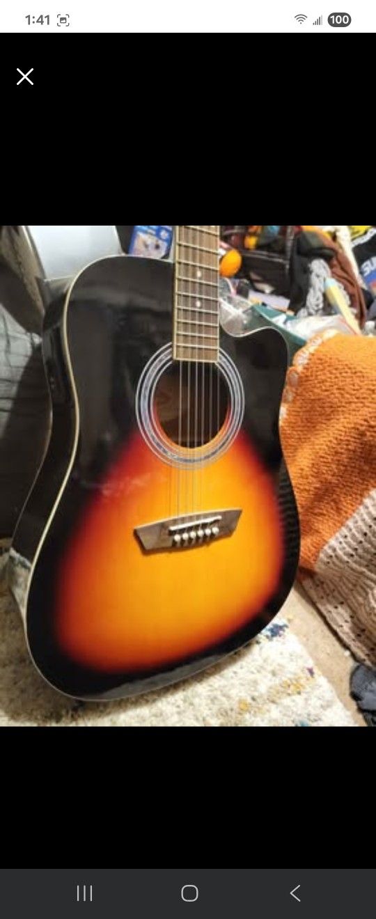 Mint washburn acoustic electric guitar set up professionally to play very easily
Sounds great