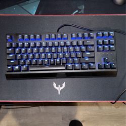 Keyboard And Mouse And Mouse Pad 