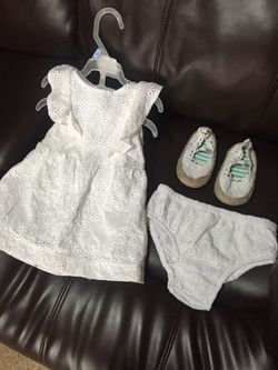 All white baby girl dress w/ bloomers and matching shoes. Very cute.