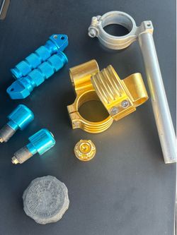 Suzuki Gsxr parts motorcycle bar ends foot pegs clamps oil