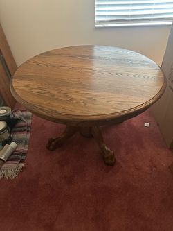 Round Oak Pedestal Dining Table with Claw Feet