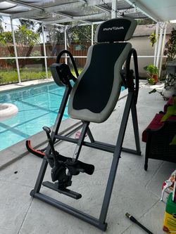 Inversión table stretch machine