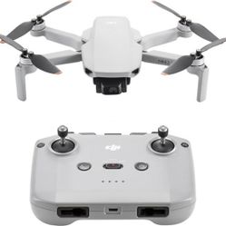 DJI Mini 2 WITH FLY MORE PACK &  RANGE EXTENDER