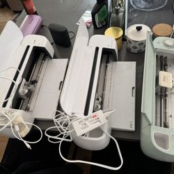 2 Cricut Makers, 1 Cricut Explore Air 2