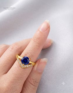 Gold-Plated Ring with blue gemstone CZ diamonds size 8.5