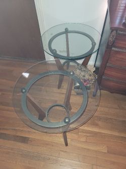 set of Glass round end tables
