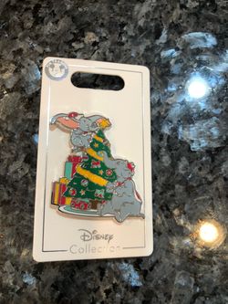 Disney Trading Pin Christmas Tree Dumbo .  Size 1 3/4 inches Tall And 1 1/2 inches Wide .  Brand New On Original Card .  Really cute