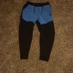 Nike tech sweats blue and black