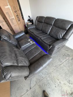 Sofa and reclining loveseat