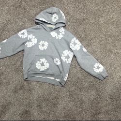 grey denim tear