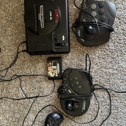 Original 16 bit Sega Genesis with fight sticks and controller